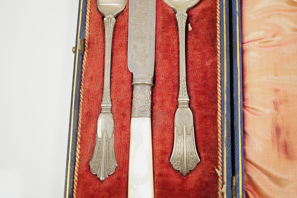 A group of assorted silver and plated wares including a silver scallop butter dish and knife and a three piece condiment set, 12 oz of weighable silver. Condition - oxidised otherwise good